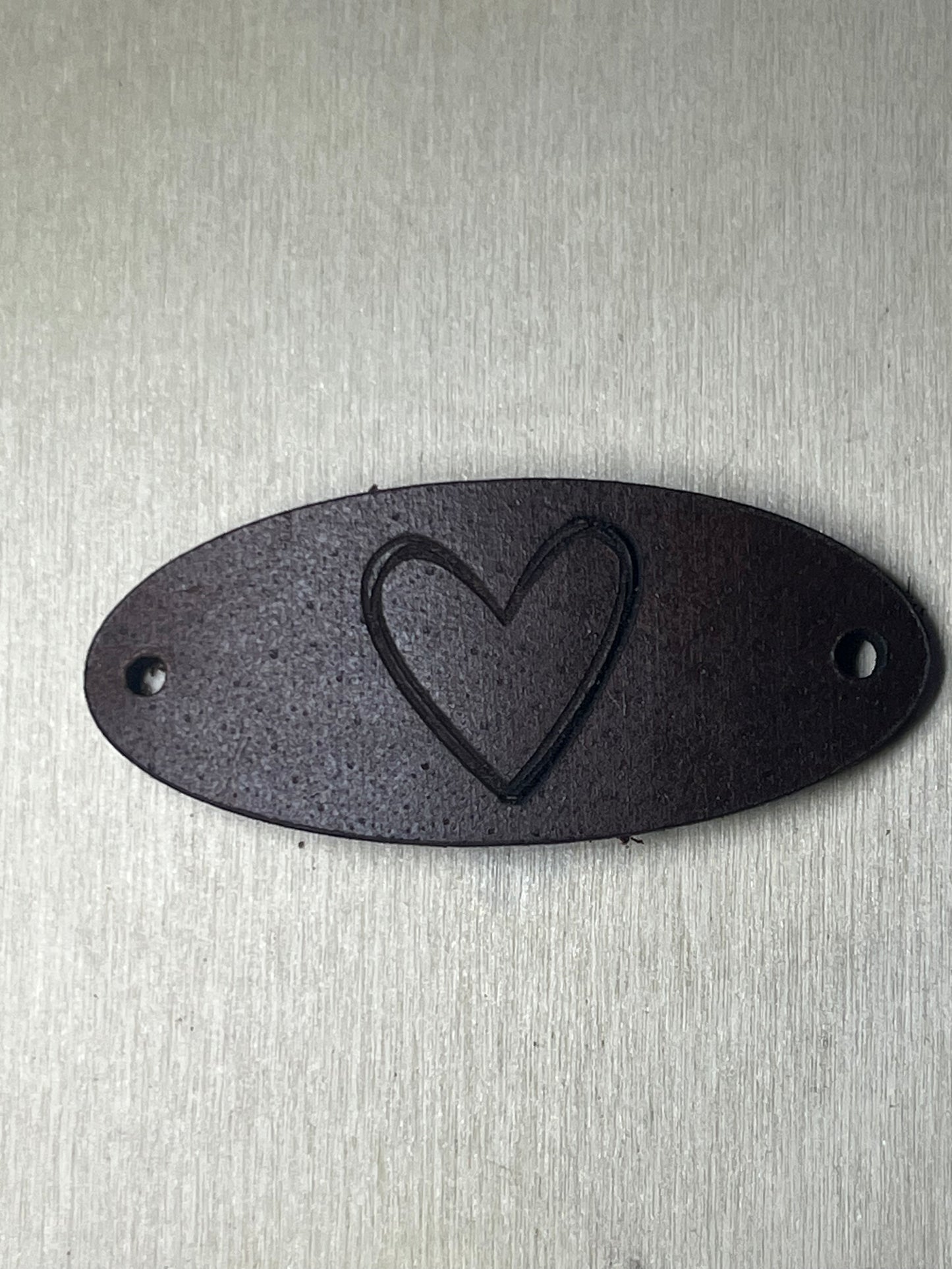 3" Oval Tag with two rivet holes -Etched heart