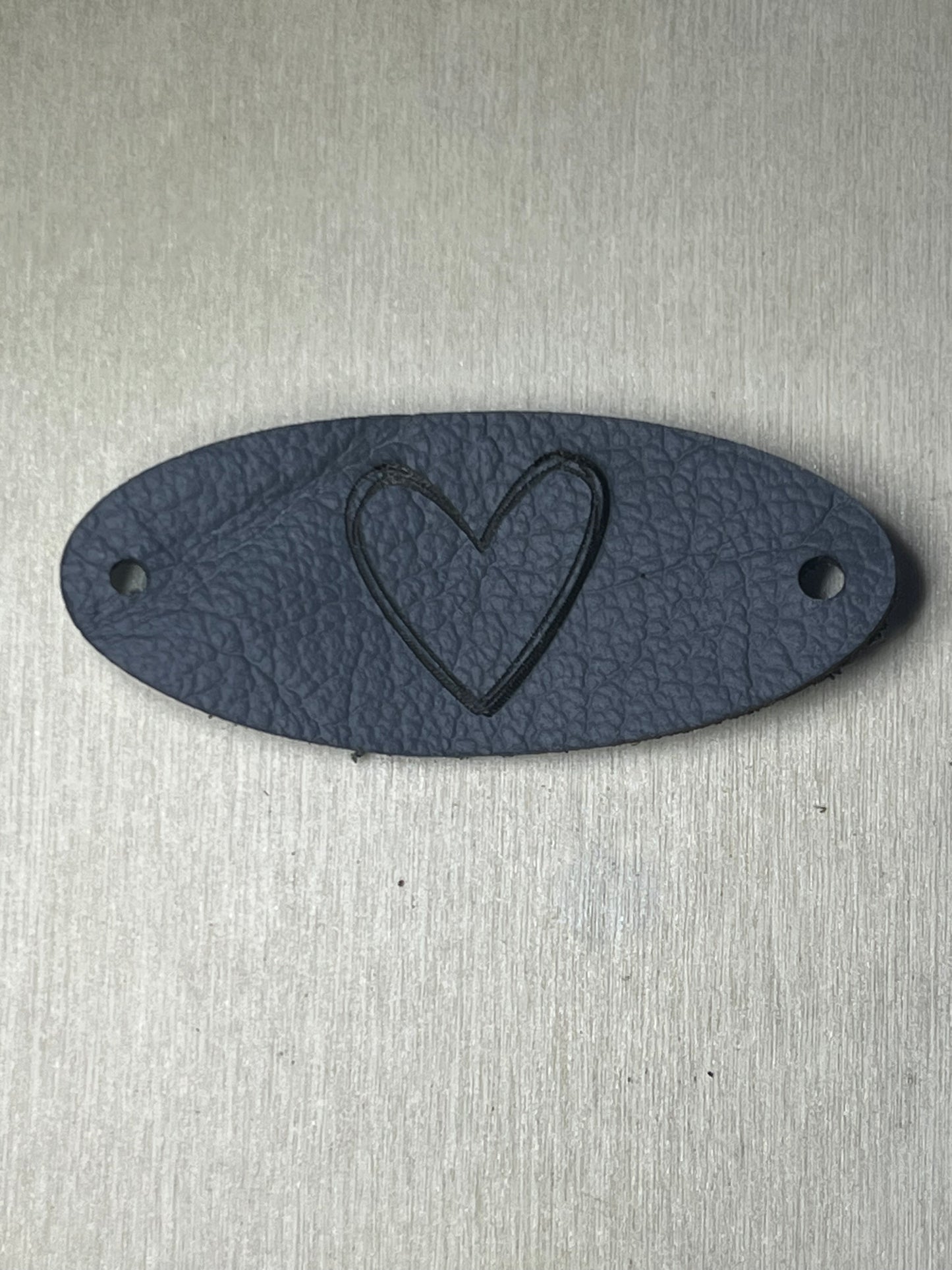 3" Oval Tag with two rivet holes -Etched heart