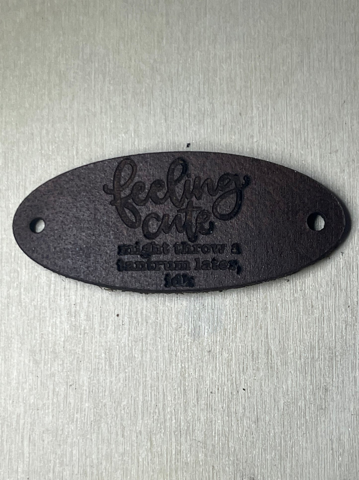 3" Oval Tag with two rivet holes - Feeling cute, might throw a tantrum later, idk