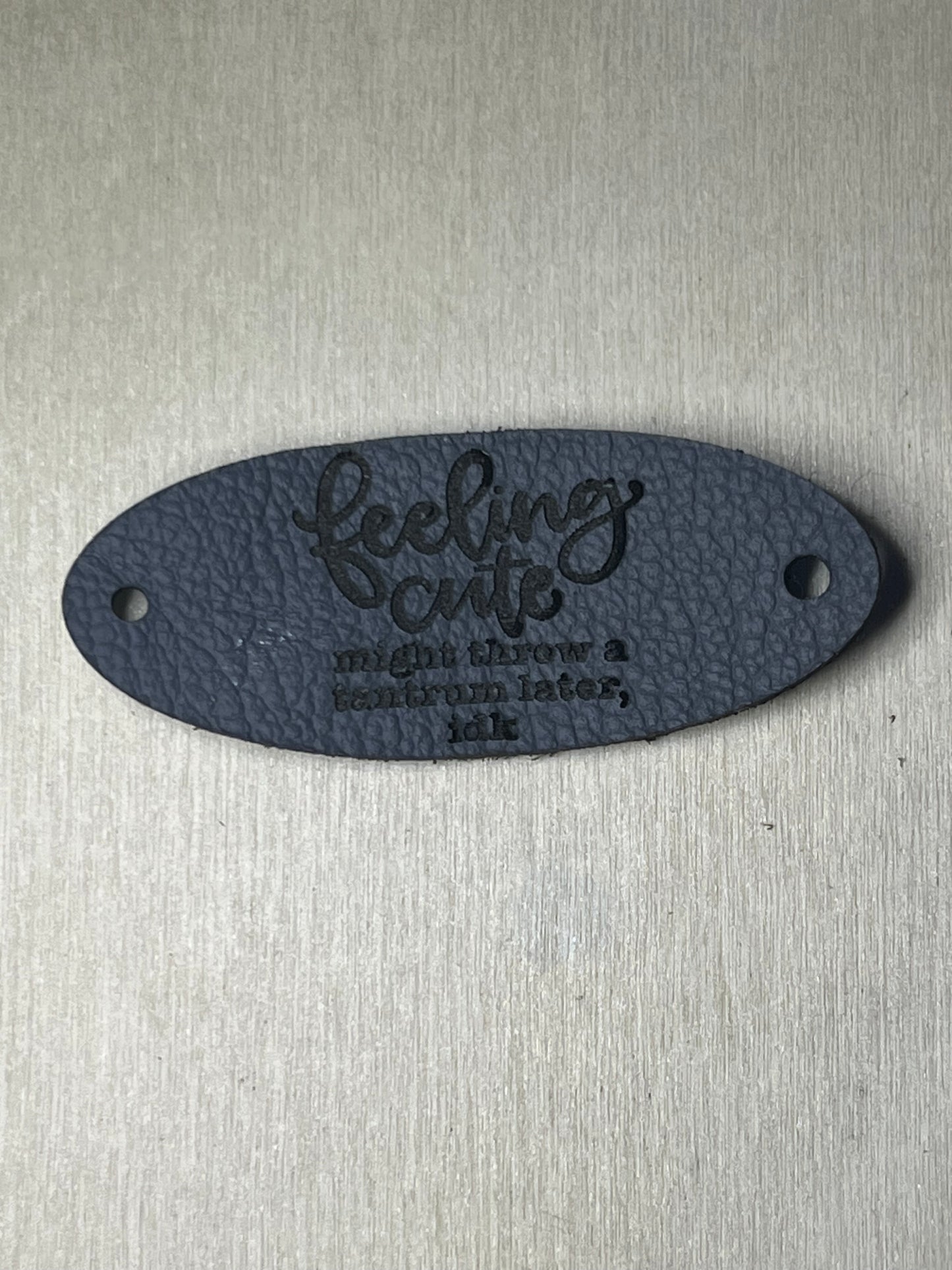 3" Oval Tag with two rivet holes - Feeling cute, might throw a tantrum later, idk