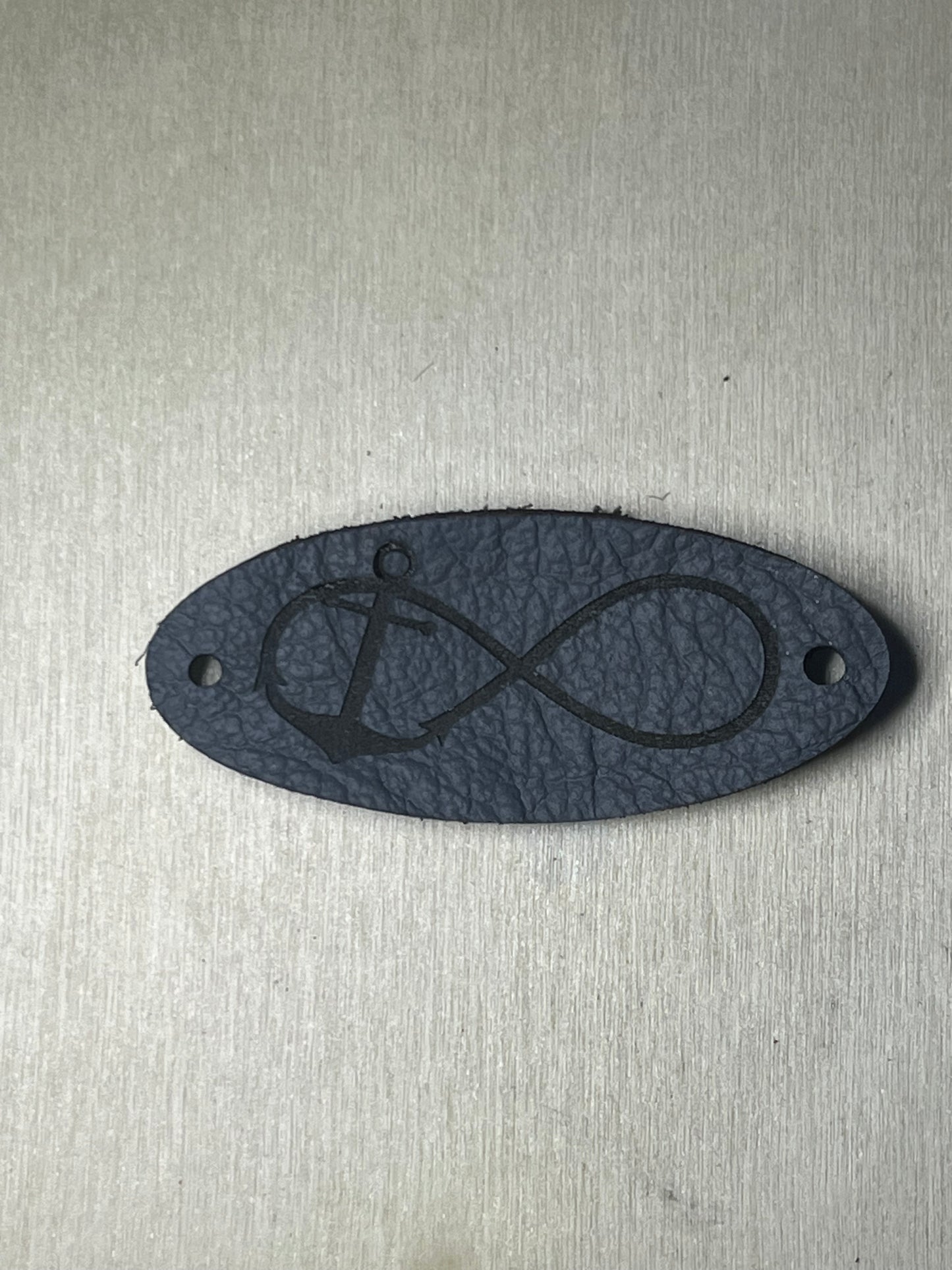 3" Oval Tag with two rivet holes - Infinity anchor