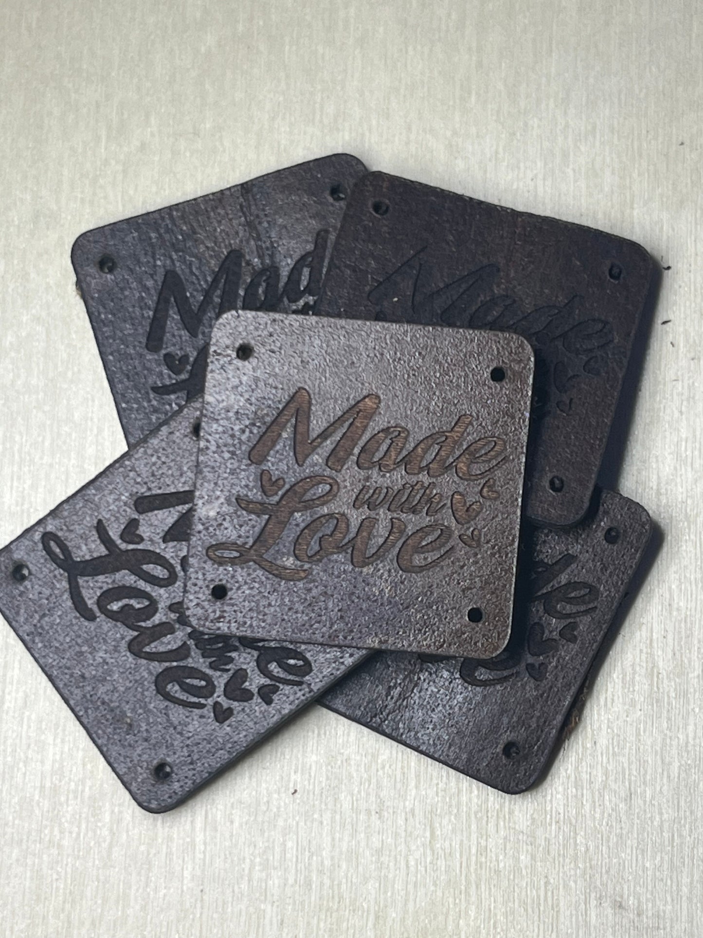 1"x1" rounded square with 4 side holes - Made with love (cursive)